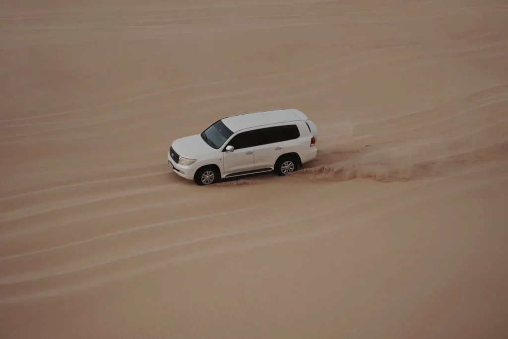 sandboarding in abu dhabi desert